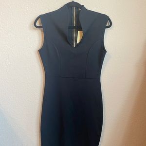 Black BodyCon Dress w/ high zip back and cool neck line